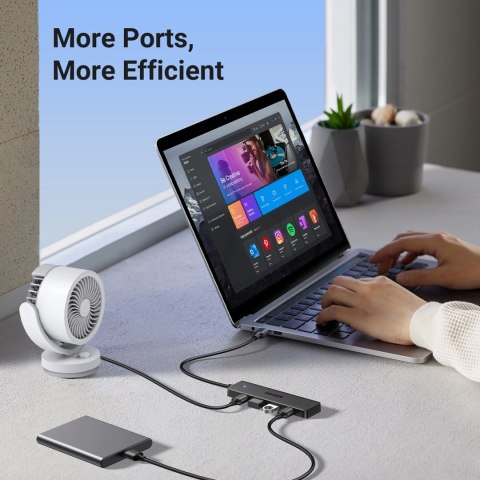 HUB Ugreen CM219 25851 z 4 portami USB-A 3.0 i kablem USB-A 3.0 15cm - czarny HUB Ugreen CM219 25851 z 4 portami USB-A 3.0 i kablem USB-A 3.0 15cm - czarny