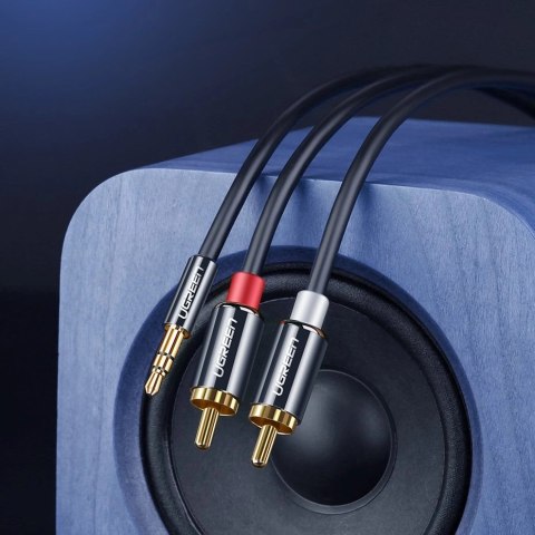 Kabel Ugreen AV116 10590 audio mini jack 3,5 mm (męski) / 2RCA (męski) 3m - czarny Kabel Ugreen AV116 10590 audio mini jack 3,5 mm (męski) / 2RCA (męski) 3m - czarny