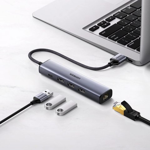 Ugreen wielofunkcyjny adapter HUB USB 3.0 - 3 x USB / Ethernet RJ-45 / USB Typ C PD szary (CM475) Ugreen wielofunkcyjny adapter HUB USB 3.0 - 3 x USB / Ethernet RJ-45 / USB Typ C PD szary (CM475)