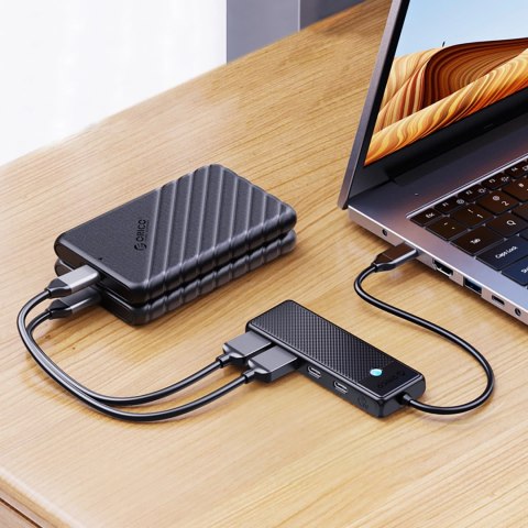 Hub USB-A Orico PAPW4A-C3 stacja dokująca 4x USB-A 3.0 - czarny Hub USB-A Orico PAPW4A-C3 stacja dokująca 4x USB-A 3.0 - czarny